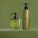 Two bottles of Ikkari hand wash on a green background